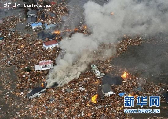 这是强震和海啸侵袭过后的日本东北部仙台机场附近的民房(3月11日摄)。 这是强震和海啸侵袭过后的日本东北部仙台机场附近的民房(3月11日摄)。