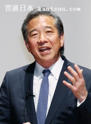 講演する日本アイ・ビー・エムのポール与那嶺社長(8日午前、東京都千代田区)